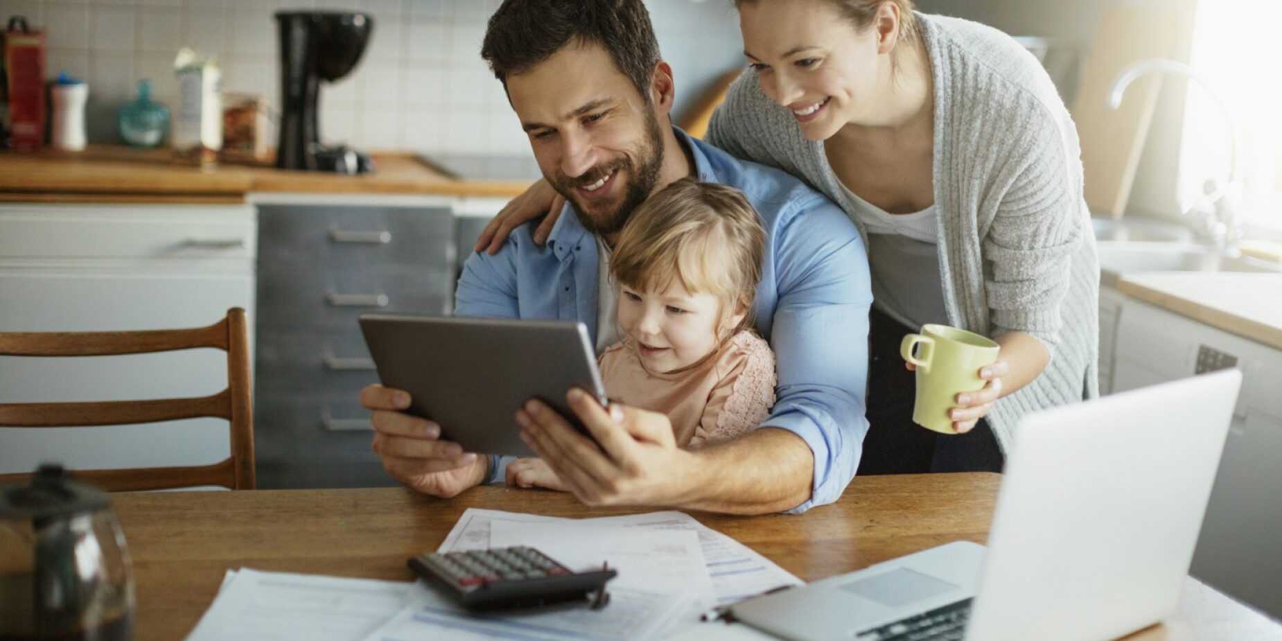Family Reviewing Financial Plan Portfolio